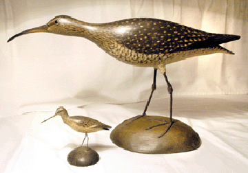 Carved in a bold running position, this curlew, carved during what has been termed Crowell's "magical period,†measured more than 17 inches from the tip of the bill to the end of the tail. It sold for $186,500, a record price paid at auction for an Elmer Crowell decorative carving.