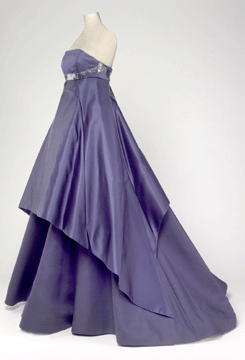 The youngest of the three designers featured in the Joan Spain Gallery, Ralph Rucci applied lessons from his study of philosophy and literature at Temple University and his interest in simplified artwork to fashion designs, such as the evening dress "The Stingray Swan,†2001, made of navy silk gazar double-faced duchess satin and ostrich spine.