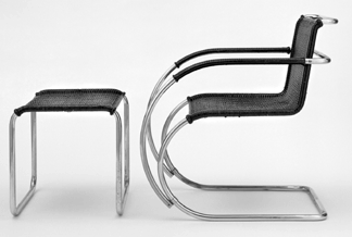 Famed German-born American architect Mies van der Rohe (1886‱969), a leader of the Bauhaus movement, designed this curvilinear armchair and stool, made of chrome-plated steel and lacquered caning, in 1927. It is displayed in the Collab Gallery.