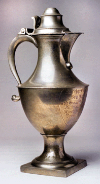The three-part sale of the Charles V. Swain collection of American pewter ended with a record price at auction for American pewter when a communion flagon attributed to William Will of Philadelphia brought $248,000. The flagon and an accompanying chalice, now at Winterthur, were presented to a church in Penns Township, Northumberland County, Penn., in 1795.