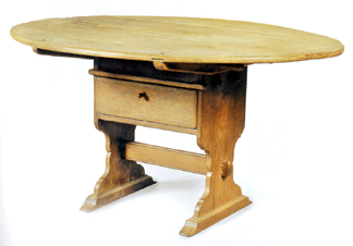 This Eighteenth Century Hudson River Valley oval hutch table from the collection of Betsy and Timothy Trace went to Philip Zimmerman, a Lancaster, Penn., furniture consultant, for $104,400. "My parents bought it from Avis and Rocky Gardiner. It was in my father's office and he always worked on it,†Jonathan Trace recalled.