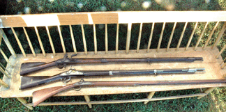 Grouping of antique firearms at Benting & Jarvis, Newbury, Mass.