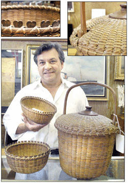 Raphael Osona with the stars of the auction †three Nantucket baskets with Coffin family provenance. The unusual covered 12-inch-tall basket sold at $69,600. The other two baskets had heart carved staves extending above the rim with the oval example, being held, selling reasonably at $13,920, while the round basket brought $34,800.