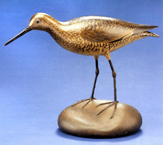 The top lot of the carvings came as a male willet in breeding plumage, marked with the oval brand, sold for $92,800.