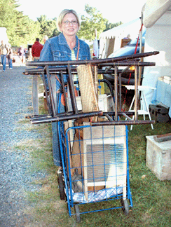 Mary Samar does some buying for Black Crow Antiques & Primitives, Williamsport, Penn. ⁎ew England Motel