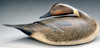 A. Elmer Crowell's preening pintail drake decoy, $1.1 million.