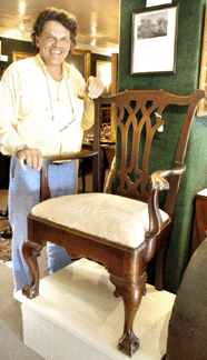 Auctioneer Kaja Veilleux with "The Washington Chair†that sold for $27,750. It had descended in the Meade family and had come from the bedroom on their estate at Dawsfield where George and Martha Washington often stayed while visiting. 