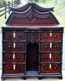 A folk carved desk brought $4,500.