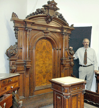 John Fontaine with the massive, three-piece walnut, set that almost doubled its presale estimate, going to $80,500 on September 29. 