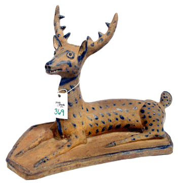 The top lot of the auction was a highly unusual stoneware folk art figure of a stag decorated with spots of cobalt. With a carved open mouth and a full set of teeth, the figure was termed by auctioneer Ron Pook as "expressive.†Bidders were also expressive as they pushed the price to $111,150.