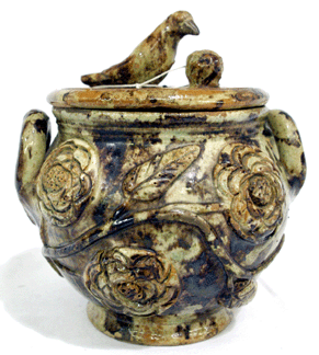 A Virginia redware covered sugar bowl by Anthony Baecher, Winchester, Va., from the Geesey collection, sold well above the $10/15,000 presale estimates, bringing $44,460.