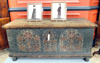 The Lancaster County dower chest decorated by the "compass artist†was in an overall blue paint with tombstone painted panels filled with red and white flowers. It brought $39,750, while the Jacob Maentel watercolors of husband and wife sold at $3,276.