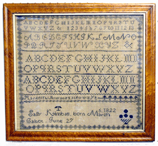 This Cabot, Vt., Nineteenth Century sampler seen at Norwoods' Spirit of America, Timonium, Md., is staying in the state, as it was sold to a Vermonter at the Bromley Mountain Antiques Show, Peru, Vt.