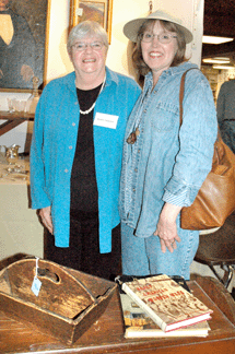 Nearly 3,000 miles may seem like a long way to go for an antique knife box, but Kathy Parker from Woodinville, Wash., shown right, with Taftsville, Vt., dealer Mary Fraser, was enjoying her annual shopping and sightseeing week in Vermont. 