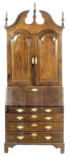 A Massachusetts Queen Anne carved mahogany desk and bookcase, 99 inches high and 38½ inches wide, sold in the middle of the presale estimate at $56,840. 