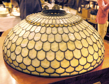 The top lot of the auction was this Tiffany Studios lamp (detail of shade shown) that attained $41,400.