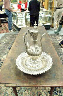 One of the biggest surprises in the sale came as this unassuming silver coffee pot seated in a matching ribbed silver shallow bowl was offered. Originally estimated at $1,2/1,800, the rare piece of Turkish silver sold for $21,850. 