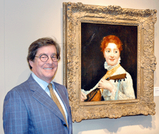 Warren Adelson of Adelson Galleries, New York City, standing next to "Young Woman with a Mandolin,†an oil on canvas painted by Mary Cassatt in Paris in 1876.
