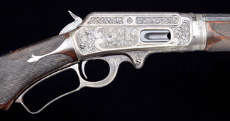 The Marlin engraved 1893 takedown lever action rifle with gold and platinum inlaid design presented by Marlin to Annie Oakley realized $253,000.