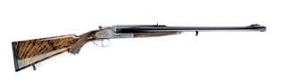 Royal presentation cased Holland & Holland big bore double rifle went out at $149,500.