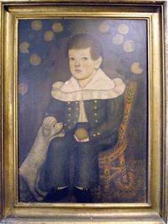 A rare American School portrait of Edward Dorr with his dog, seated in a brightly decorated yellow chair positioned on an Oriental carpet with trees laden with oranges forming a backdrop, sold to David Schorsch for $886,000.