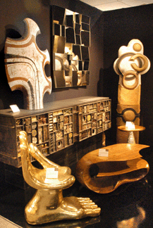 The Paul Evans steel front console with "Tribesman,†a stoneware sculpture by Elaine Katzer, at Todd Merrill Antiques, New York City.