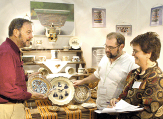 Don Carpentier's Pottery, Nassau, N.Y. Don and partner Stephen Apisa speak with Lee Wheeler of the Shelburne Museum.