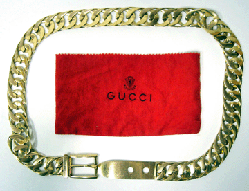 The top lot of the auction was this 18K gold Gucci belt that achieved $10,300.