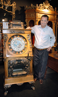 Jonathan Daniels of Daniels Antiques, Hallandale, Fla., shows a Caille Brothers Venus upright slot machine, circa 1907, one of four known examples.