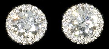 Commanding the day's high price was this pair of Tiffany & Co. diamond stud earrings with GIA certified center gems of more than 1 carat each, surrounded by smaller diamonds, all set in platinum, which made $39,000.