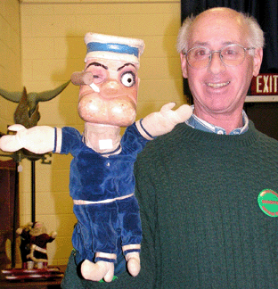 Show promoter Bob Lutz poses with Popeye, the Sailor Man.
