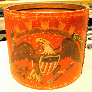 The red painted drum with spread-winged eagle emblazoned across the front and "U.S. Marines†painted above the eagle's wings was thought to perhaps be the earliest known regulation USMC drum by William Ent, Germantown, Penn. Retaining its original label on the interior, it was displayed by Dave Kliener, Bloomingburg, N.Y. 