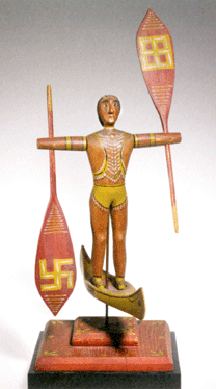 A popular form for whirligigs, this Indian in a canoe from the late Nineteenth Century is well carved and painted. Collection of Mary Ingebrand-Pohlad.