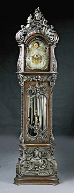 This circa 1895 Waltham Clock Company rococo revival carved walnut nine tube tall case clock, retailed by Smith Patterson Company and playing Whittington and Westminster chimes, sold for $51,700 to a telephone buyer. 