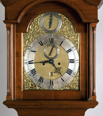 A Chester County, Penn., Chippendale walnut tall case clock with an eight-day silvered dial, inscribed "Isaac Thomas Willistown,†realized $42,120. 