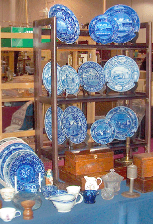 Mike Biggers, Cary, N.C., is a dealer with small antiques and great sales at the January market.