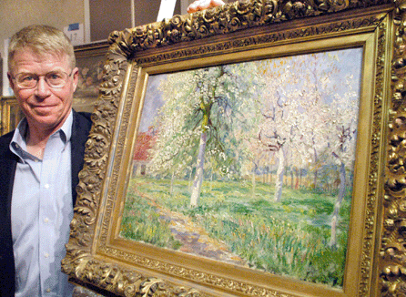 Trinity International principal Steve Gass with the top lot of the auction, the Theodore Wendel oil on canvas titled "Giverny Farmhouse in the Spring†that sold for $48,000.