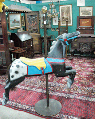 Wolf's Den Antiques, Westford, Mass., showed a Herschell-Spillman carousel horse, circa 1920s.