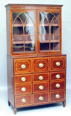 This George III inlaid mahogany bookcase rose to $7,137.
