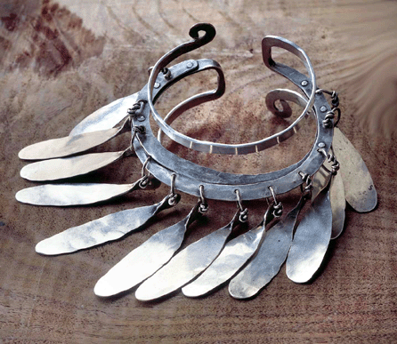 Calder often incorporated "primitive†touches into his work. The closely laid, parallel strips of flattened silver wire of this "Bracelet,†circa 1948, may have been inspired by his knowledge of ornamental objects worn by African tribesmen. Private collection. ©2007 Calder Foundation, New York City.