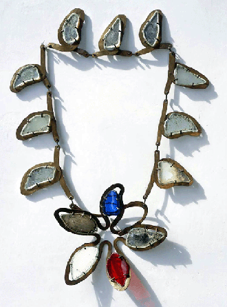 This exquisite, one-of-a-kind "Necklace,†circa 1938, made of brass wire, glass and mirror was included in an exhibition of Calder's jewelry at New York's Marian Willard Gallery in 1940. Private collection, New York. ©2007 Calder Foundation, New York City.