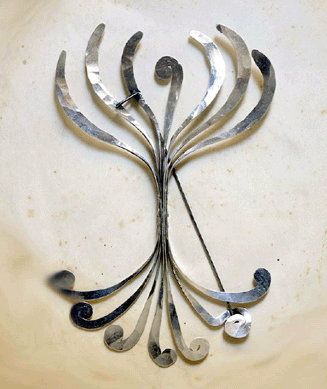 In this "Pin†or "Brooch,†fashioned around 1945, Calder twisted silver and steel wire into a characteristically idiosyncratic shape. It is 4¼ by 6¾ inches. Private collection. ©2007 Calder Foundation, New York City.