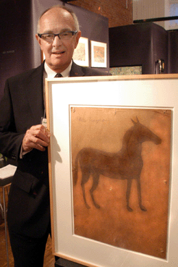 Carl Hammer with a work by Bill Traylor, Carl Hammer Gallery, Chicago.