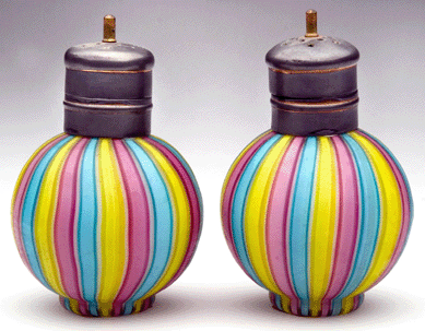 This pair of bulbous salt and pepper shakers in rainbow colors, probably European and from the Twentieth Century, came from the Fenton collection. The pair sold for $3,390, more than five times the high estimate.  
