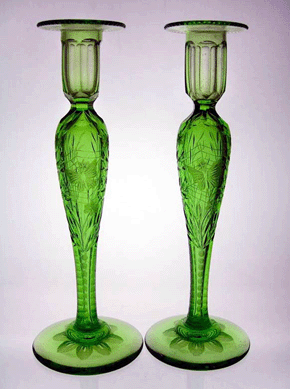 Pair of candlesticks in Garland pattern, 1920‱930, Pairpoint Corporation, American Glass. On loan from a private collection.