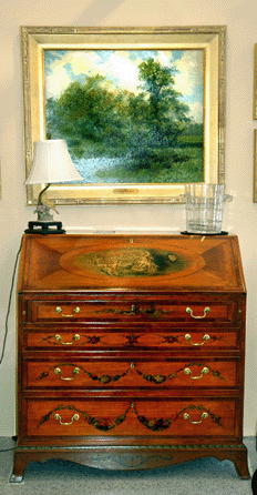 Nicoll Fine Art and Antiques, Newcastle, Maine, was showing a period English satinwood desk with Adams-style paint decoration, possibly by Angelica Kauffman.
