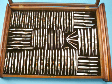 This scarce hardware or cutlery store sample case of 98 pocket knives, with matching gold hand-lettered wood sign "A. Burkinshaw, Pepperell, Mass.,†sold to a relative of a previous owner for $92,000.