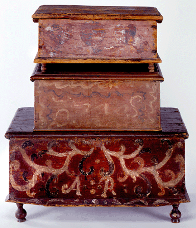 Three gaily painted boxes exhibit varying degrees of artistic skill, which is their charm, but each is decorated exuberantly. The top one, from coastal New Hampshire, is painted and incised with hearts and a central globe and was made around 1710‱750. The middle example has a freeform design and was made somewhere in New England between 1750 and 1780, while the example on the bottom was made between 1710 and 1750.