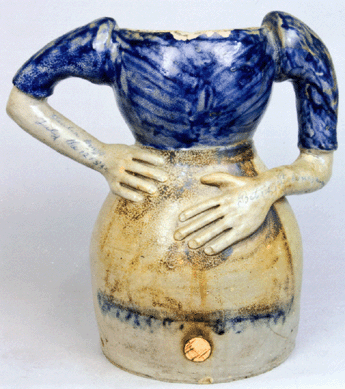 An important water cooler in the form of a woman at the time when Nineteenth Century figural stoneware was rare achieved $34,500.