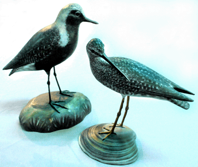 The Elmer Crowell decorative carvings did well, with a yellowlegs in a preening pose selling at $24,150, while a black bellied plover fetched $18,400.